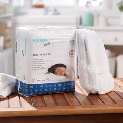 McKesson Youth Pants, Overnight Pediatric Pants for Boys or Girls, Disposable Training Pant, 12 Hour Protection - Size Small/Medium, 38-65 lbs, 17 Count, 4 Packs, 68 Total